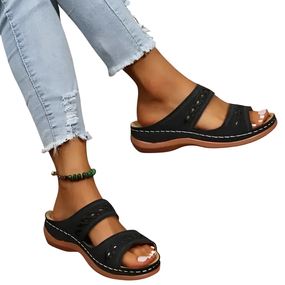 Sandales à enfiler en cuir noir avec deux brides et des perforations décoratives.