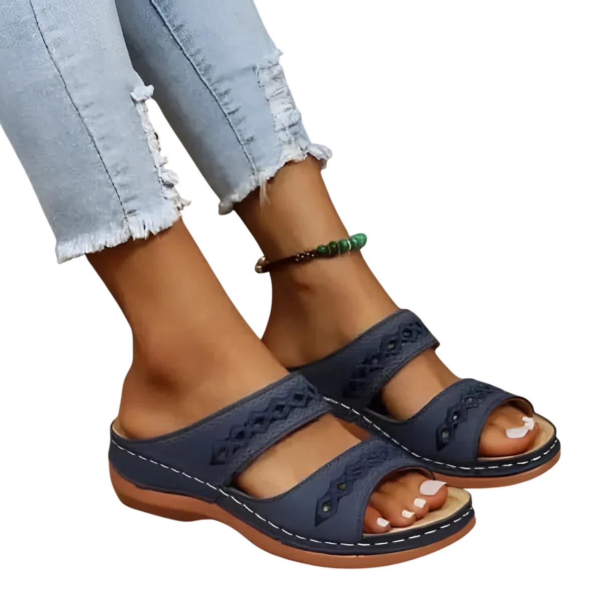 Sandales en cuir bleu marine avec découpes décoratives et semelle confortable.