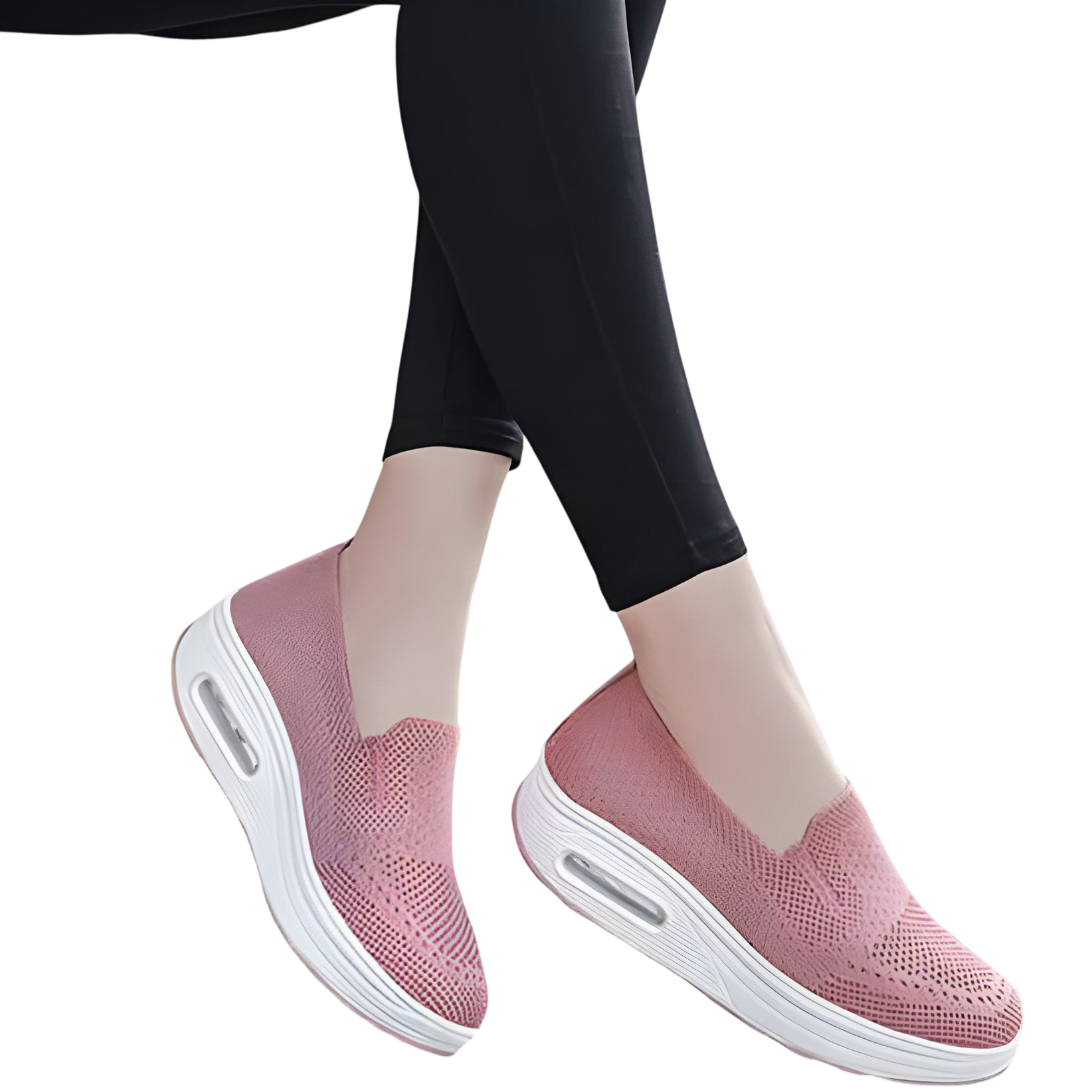 Baskets roses à enfiler avec une épaisse semelle blanche et un coussin d’air.